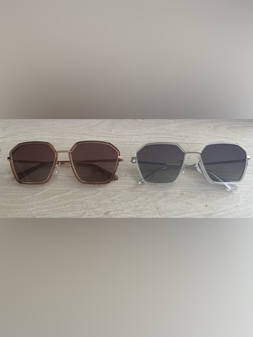 Two pairs of Carve Sunglasses in Brown and Clear color